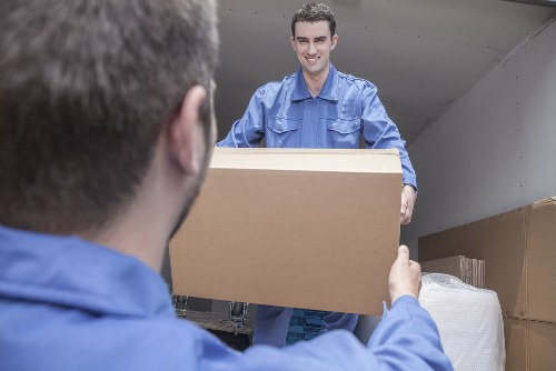 Professional office removals in Stmargarets with moving boxes and workspace equipment