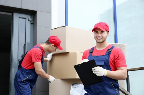 Staff and customers following safety procedures at a storage facility entrance
