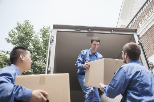 Office movers transporting desks and IT equipment in Stmargarets