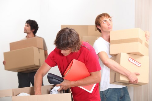 Packed moving boxes and furniture ready for transport during a Stmargarets removal