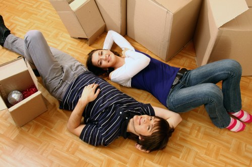 Boxes and furniture being carried from an apartment in Stmargarets