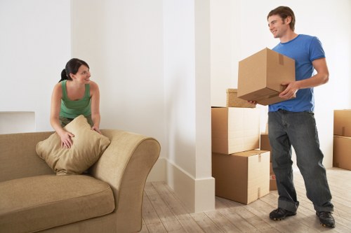 Home moving team handling furniture in St Margarets